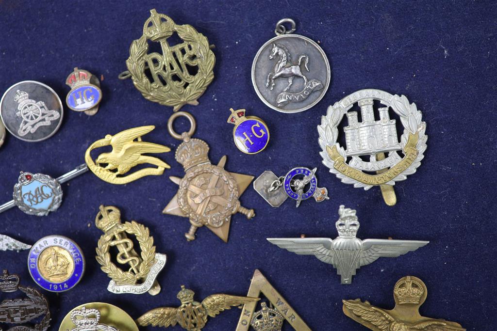 A quantity of Military and Civilian medals / badges